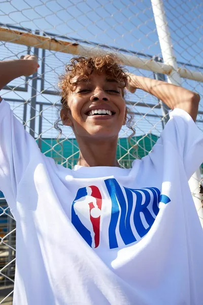 قميص فضفاض أبيض للجنسين من القطن %