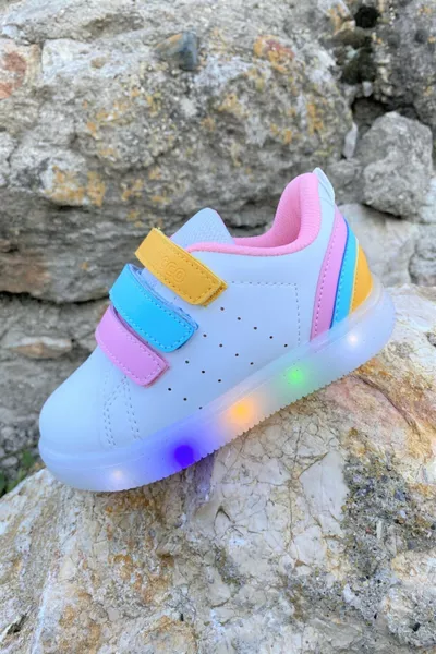 حذاء رياضي بأرضية تقويمية مع إضاءة LED باللون الأبيض (المقاسات من  إلى )