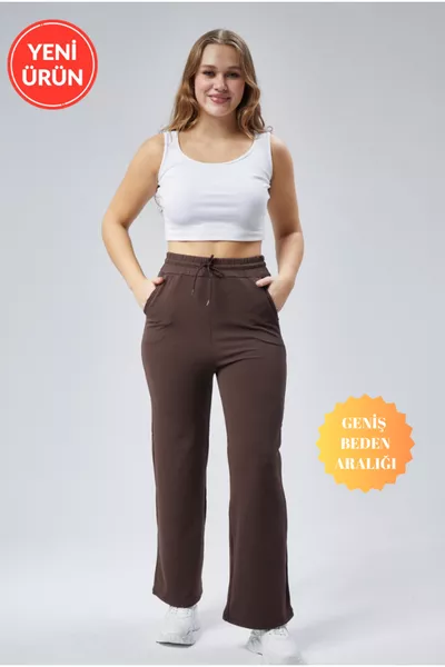 Pantaloni della tuta da donna Curve marroni con doppie tasche, vita elasticizzata, gamba a tubo con costine