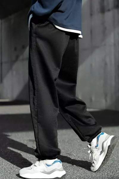 Pantaloni della tuta oversize neri con stampa