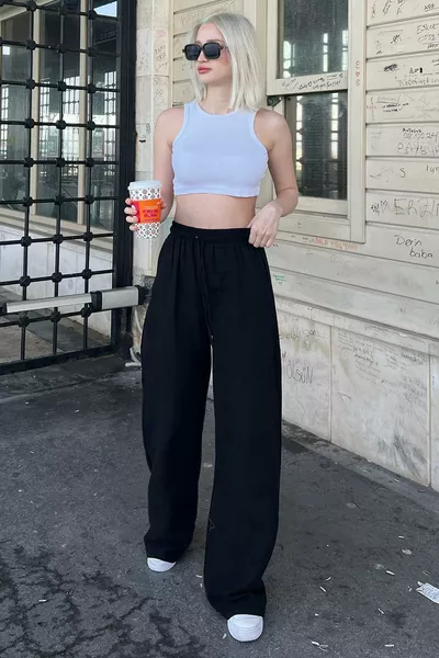 بنطال نسائي أسود واسع الساق من القطن الخفيف 