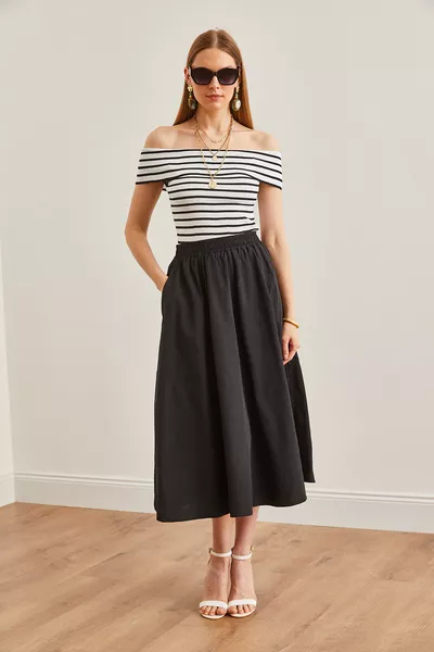 تنورة نسائية متوسطة الطول سوداء بجيوب وخصر مطاطي 