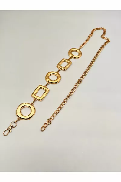 Goldener Metallgürtel mit quadratischen und runden Details