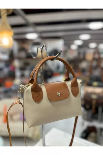 حقيبة يد وكتف متوسطة الحجم للنساء بمقبض من الجلد الصناعي بلون البيج الداكن