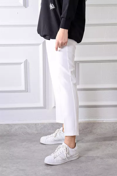 بنطلون قلم بخصر مطاطي بلون عاجي 