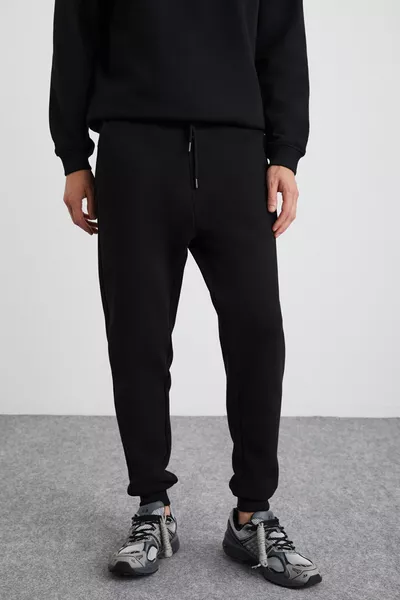 سروال رياضي رجالي أسود أدنس قطن عضوي عادي، داخله مبطن بقماش ناعم، وحواف مرنة