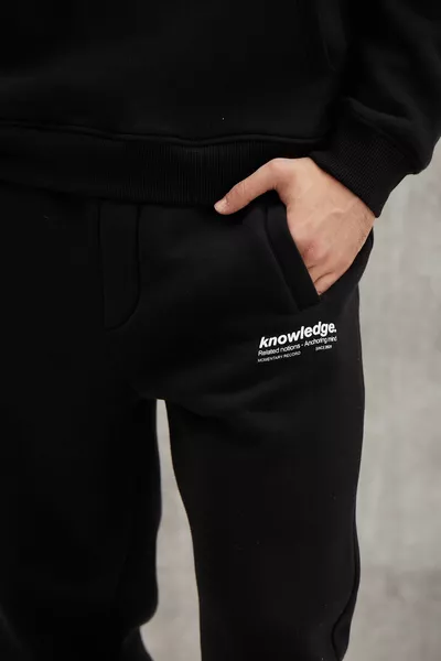 Bernon Pantalon de survêtement homme élastique doux à jambe étroite trois poches en coton bio noir