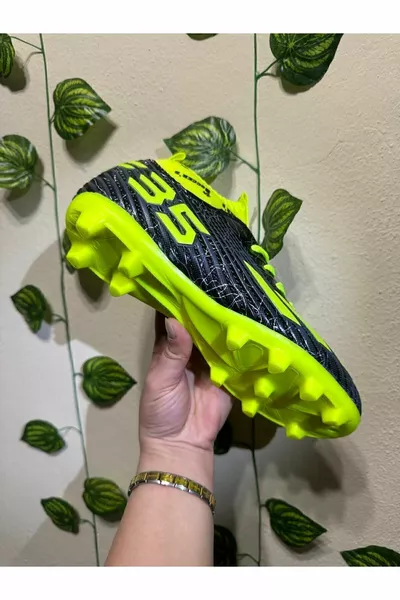 YM Shopping by Fußball der neuen Saison Schwarz-gelbe Fußballschuhe