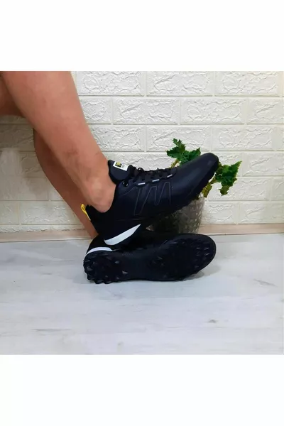  حذاء كرة قدم أسود-أصفر Astroturf