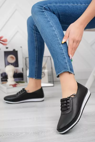 العظام عارضة لينة المرأة الجلد الأسود الرباط الباليه الشقق