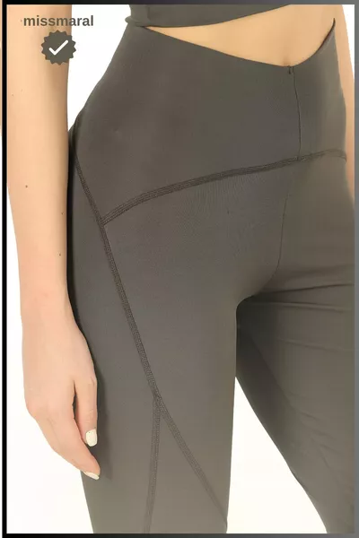 ليق رياضي ضيق الخصر عالي اللون زيتي / كاكي بتصميم مشد تفاصيل خياطة فلاتلوك تصميم مناسب أوسلو 