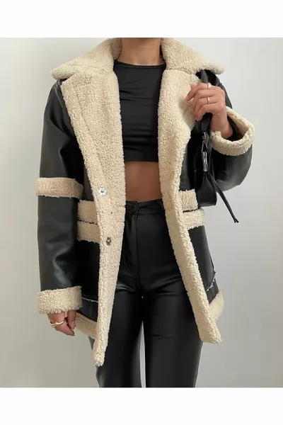 Cappotto da donna in pelliccia di peluche nera