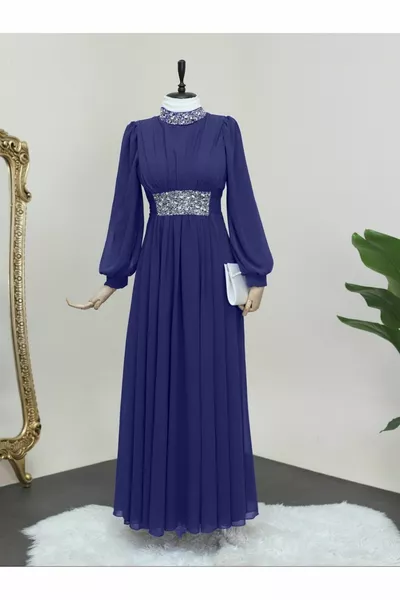 Chiffon evening dress with stone detail on the collar and waist