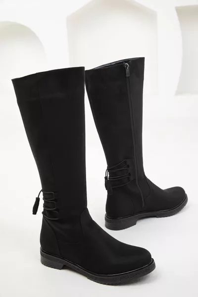 حذاء نسائي من جلد الغزال الأسود 