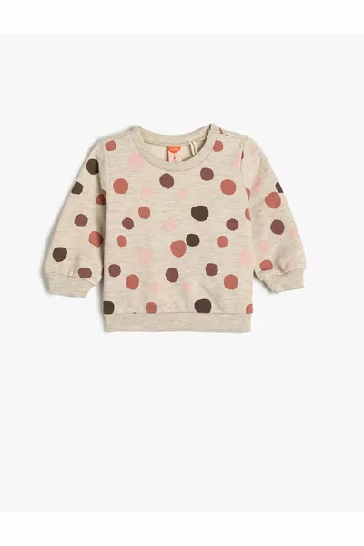 سويت شيرت بأكمام طويلة وياقة دائرية مع تفاصيل مطبوعة وداخل مبطن بالوبر