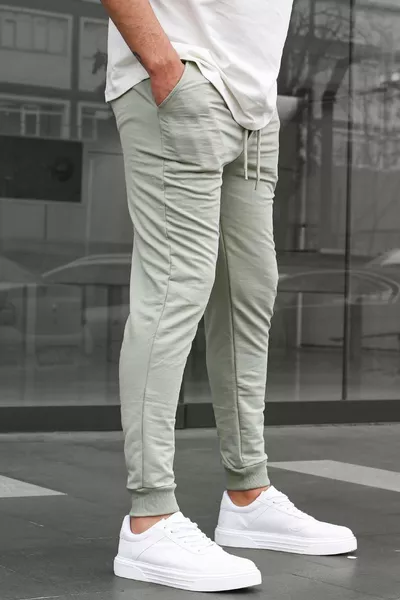 بنطال رياضي رجالي بخصر مطاطي باللون الأخضر الفاتح 