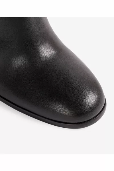 أحذية مطاطية بكعب عال