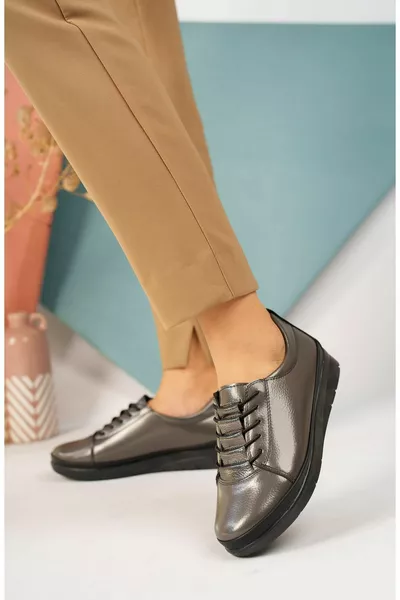 Gewatteerde zool platina rubberen veterschoenen met orthopedische pads