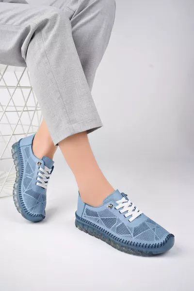 جلد طبيعي الدنيم الأزرق المرأة الجلود عارضة 