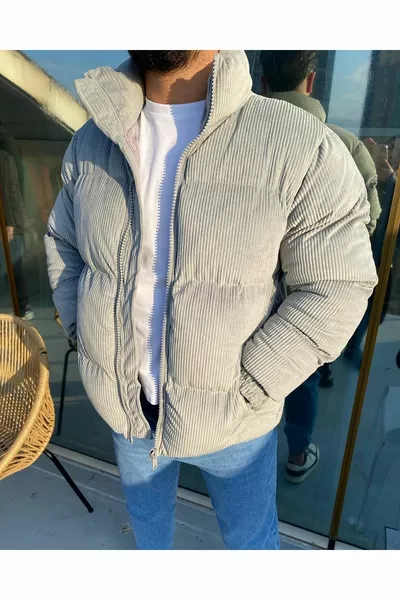 Piumino grigio a costine in velluto