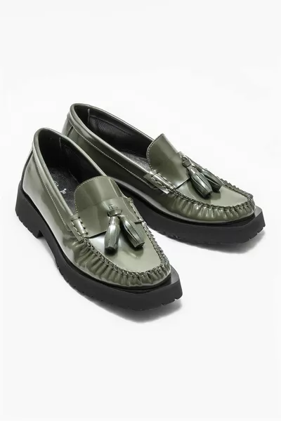 الكاكي الجلود المرأة المتسكع