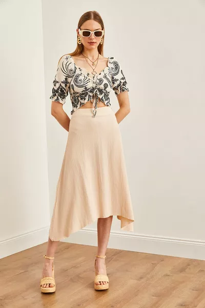 Jupe asymétrique élastiquée taille pierre femme 