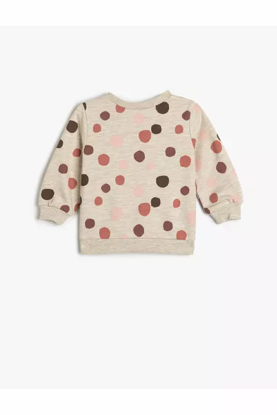 سويت شيرت بأكمام طويلة وياقة دائرية مع تفاصيل مطبوعة وداخل مبطن بالوبر