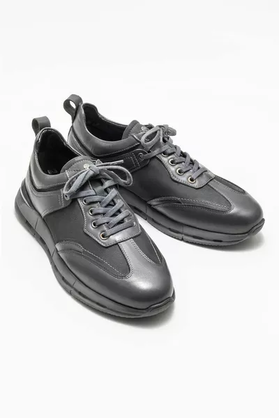 حذاء رياضي رجالي جلد رمادي