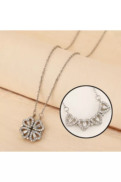 عقد ثلاثي القلوب من الفولاذ مع حجر الزركون وزهرة البرسيم قابلة للفتح والإغلاق بمغناطيس