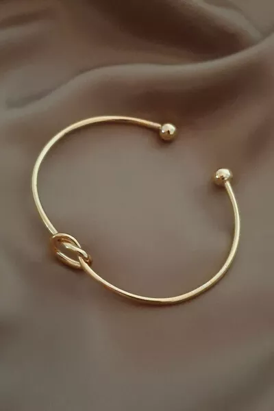 Gold Color Women's Bracelet with Gold Knot Detail and Adjustable Cuff