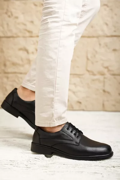 حذاء جلد طبيعي أسود للرجال كاجوال 