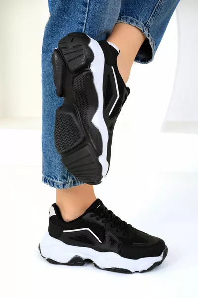 حذاء نسائي رياضي أسود وأبيض 