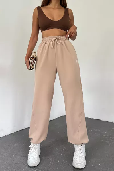 Дамски панталон/спортен панталон с кремави бродерии, регулируеми, оувърсайз с широки крачоли