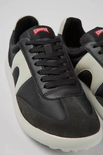 جزء علوي من الجلد والقماش للرجال ، بطانة من قماش النعل الخارجي Eva ، كاجوال أسود كاجوال