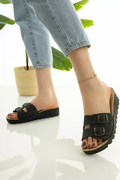 Pantofole con tacco imbottito da donna