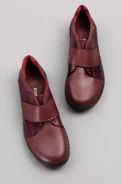 جلد طبيعي التشريحي وحيد أحذية الفيلكرو مريحة ell. - 