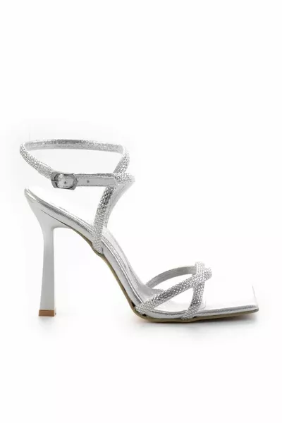 عرجاء المرأة مساء اللباس أحذية 