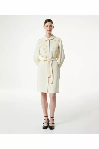 Geborduurde crêpe jurk