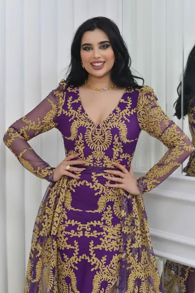 Abito da sera con design glitterato in rilievo su tulle flessibile