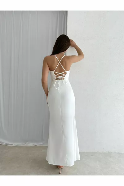 Weißes Midikleid in Korsettform mit tiefem Rücken und tiefen Schlitzen und dünnen Trägern