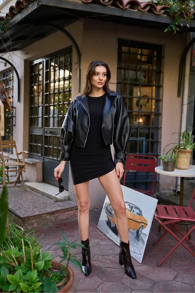 المرأة سترة جلدية كبيرة الحجم