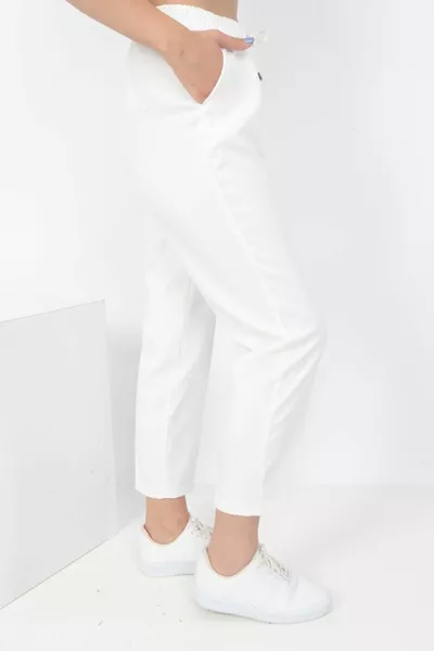 بنطال نسائي أبيض بقماش مزدوج، خصر مطاطي وساق ضيقة