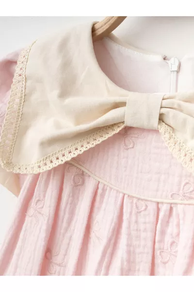 فستان رضّاعات بناتي بنقشة فيونكة مع ياقة