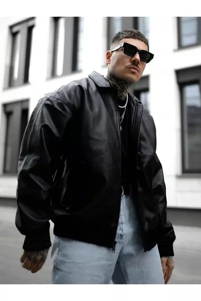 معطف جلدي أسود كبير الحجم طراز التسعينيات