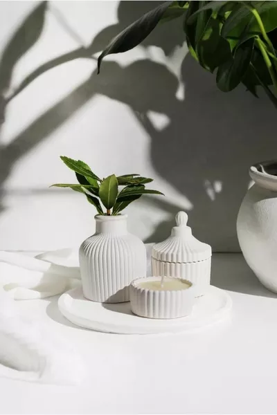 طقم شمعة و مزهرية بصحن دائري