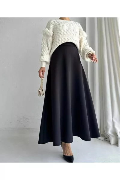 تنورة نسائية محتشمة يومية من قماش محاك مستورد أسود، القَصّة واسعة، الطول:  سم (مزودة بحزام مطاطي)