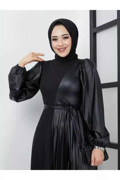 Robe combinaison en cuir à détails plissés