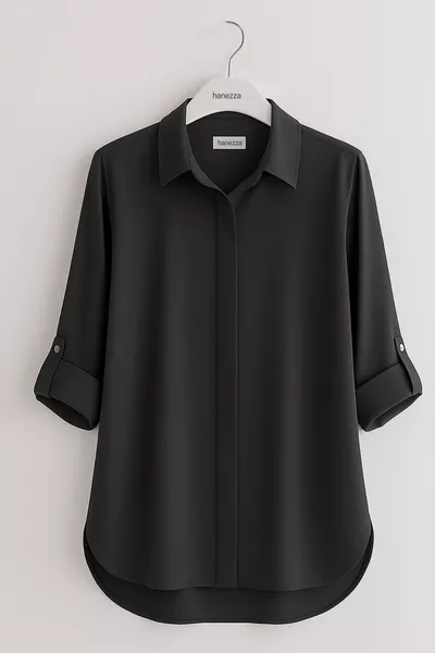 سحر اللون الأسود: عكس تألقك في ليلة رأس السنة بواسطة القمصان السوداء للمقاس الكبير