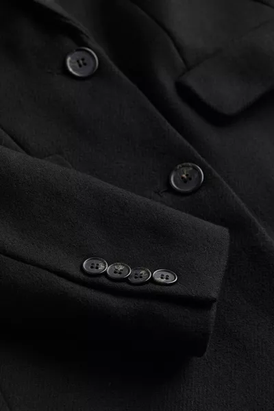 معطف بصف واحد من الأزرار