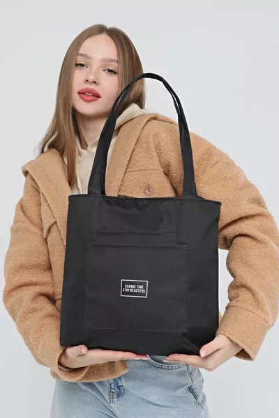 Sac en toile noire avec fermeture éclair et 2 poches avant